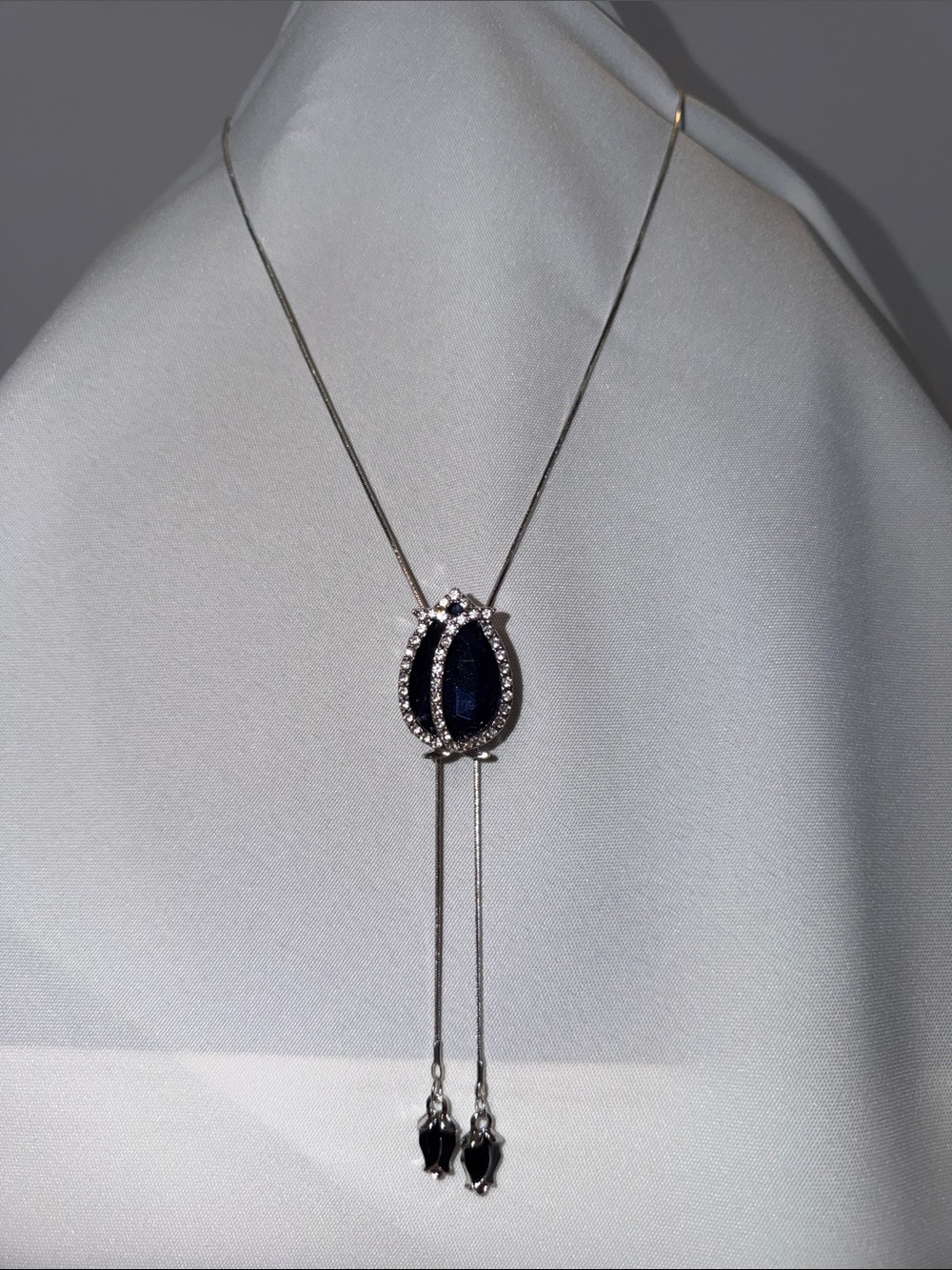Silver Rose Necklace with Dark Blue Stone